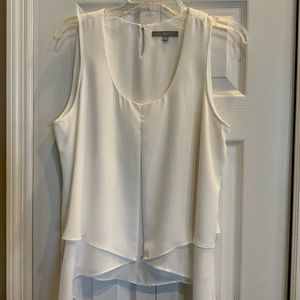 Sleeveless top with scaffled bottom